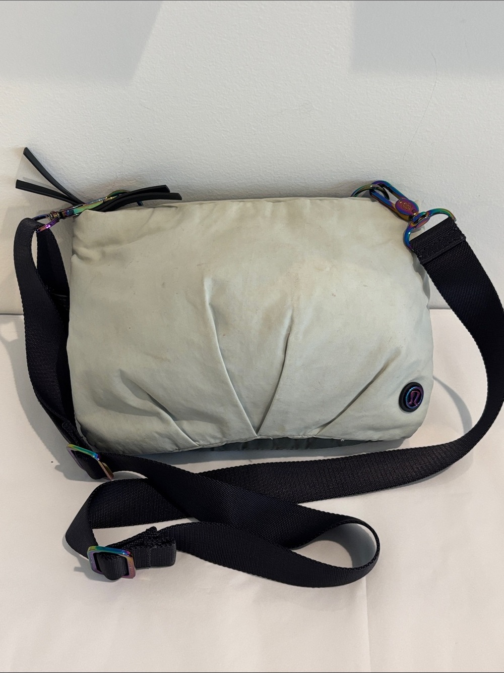 Lululemon Hip to Be Free convertible crossbody bag with a pleated zippered grey
